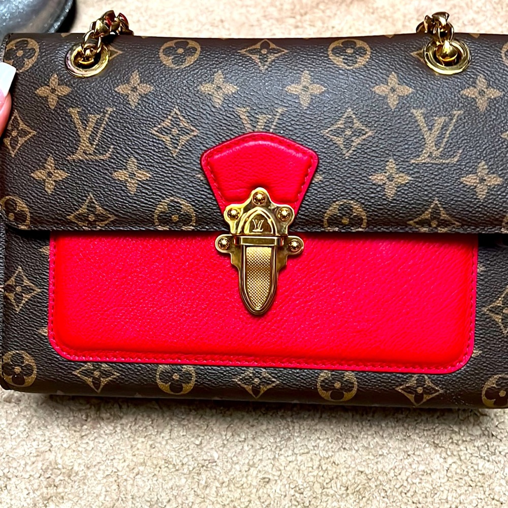 Red and brown Louis Vuitton with gold chain